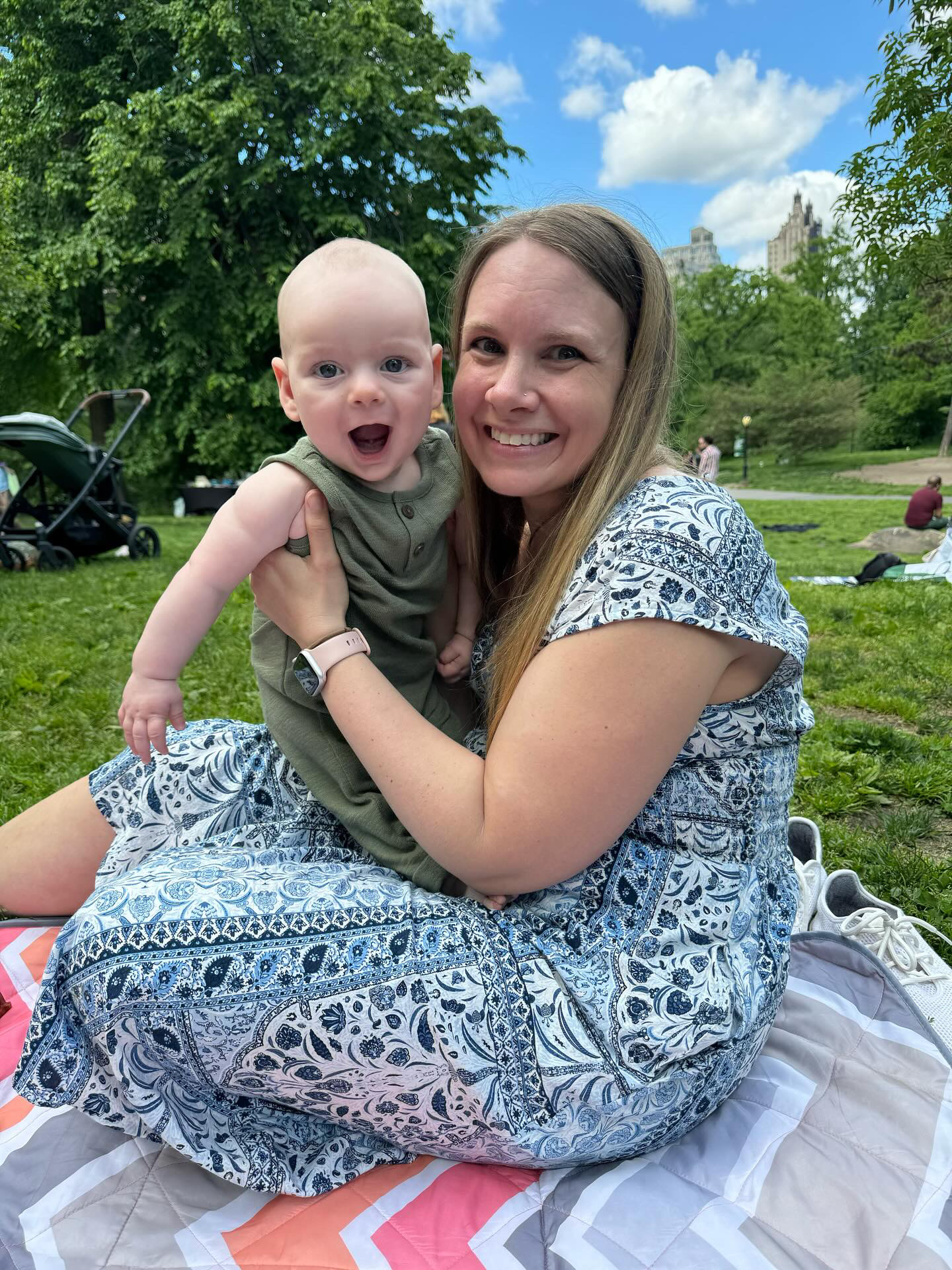 Happy client and baby in the park